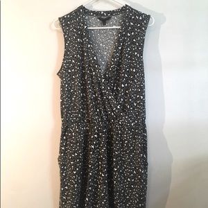 Banana Republic green, black and white leopard print romper in size large.